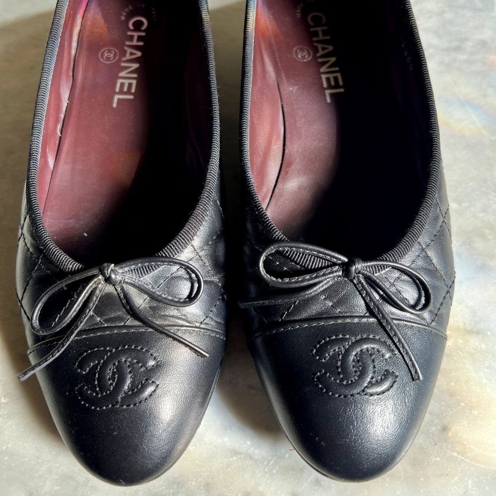 Chanel black quilted flats